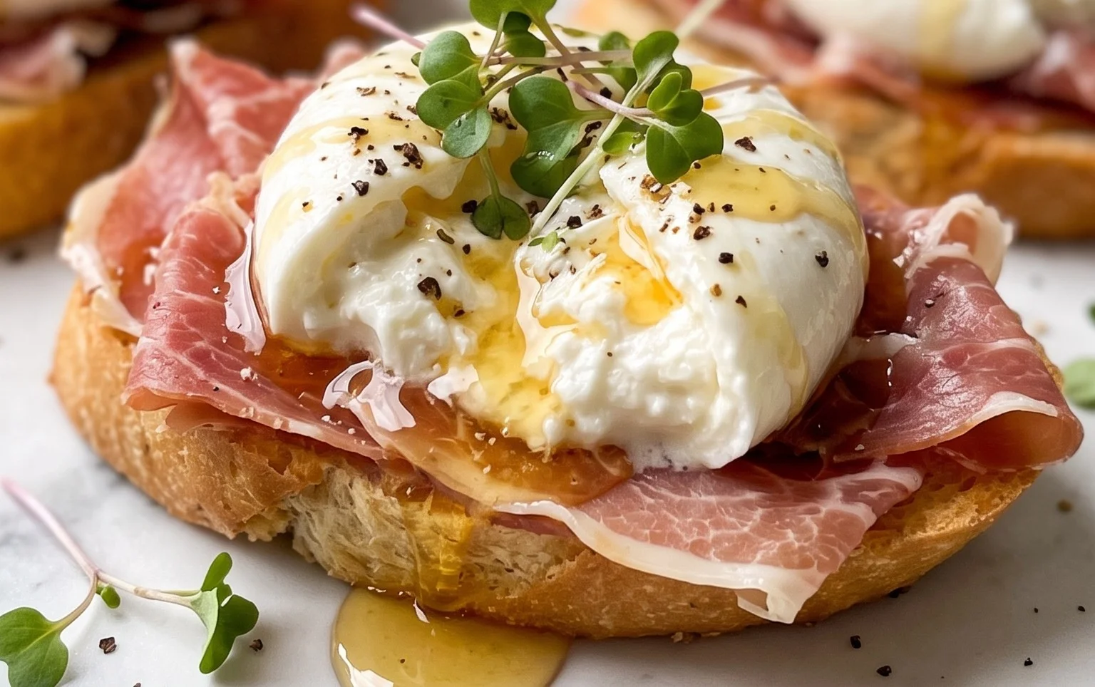 Beef Prosciutto Crostini with Burrata and Lemon Honey Drizzle